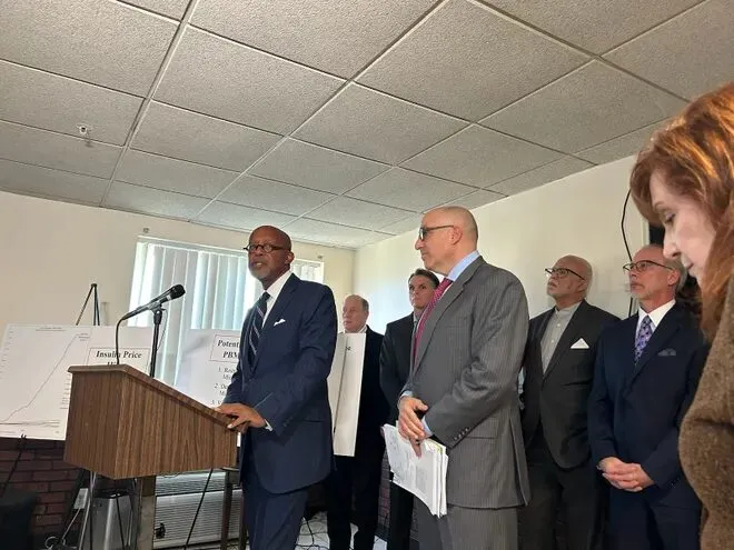 Press conference with Mark Bernstein standing to the side