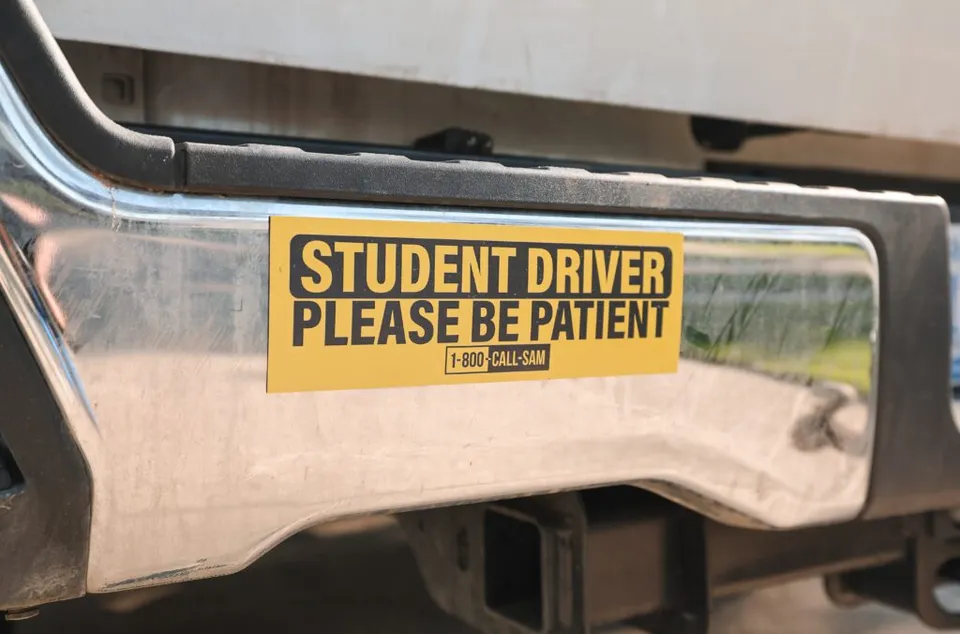 Call Sam student driver magnet on a truck bumper