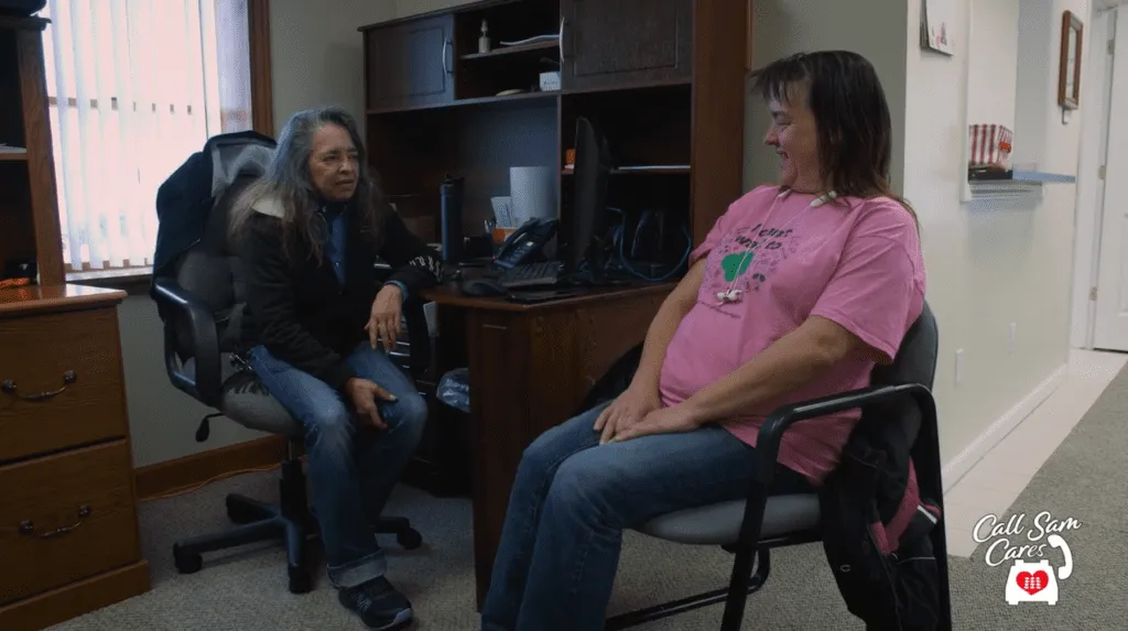 2 women talking in office