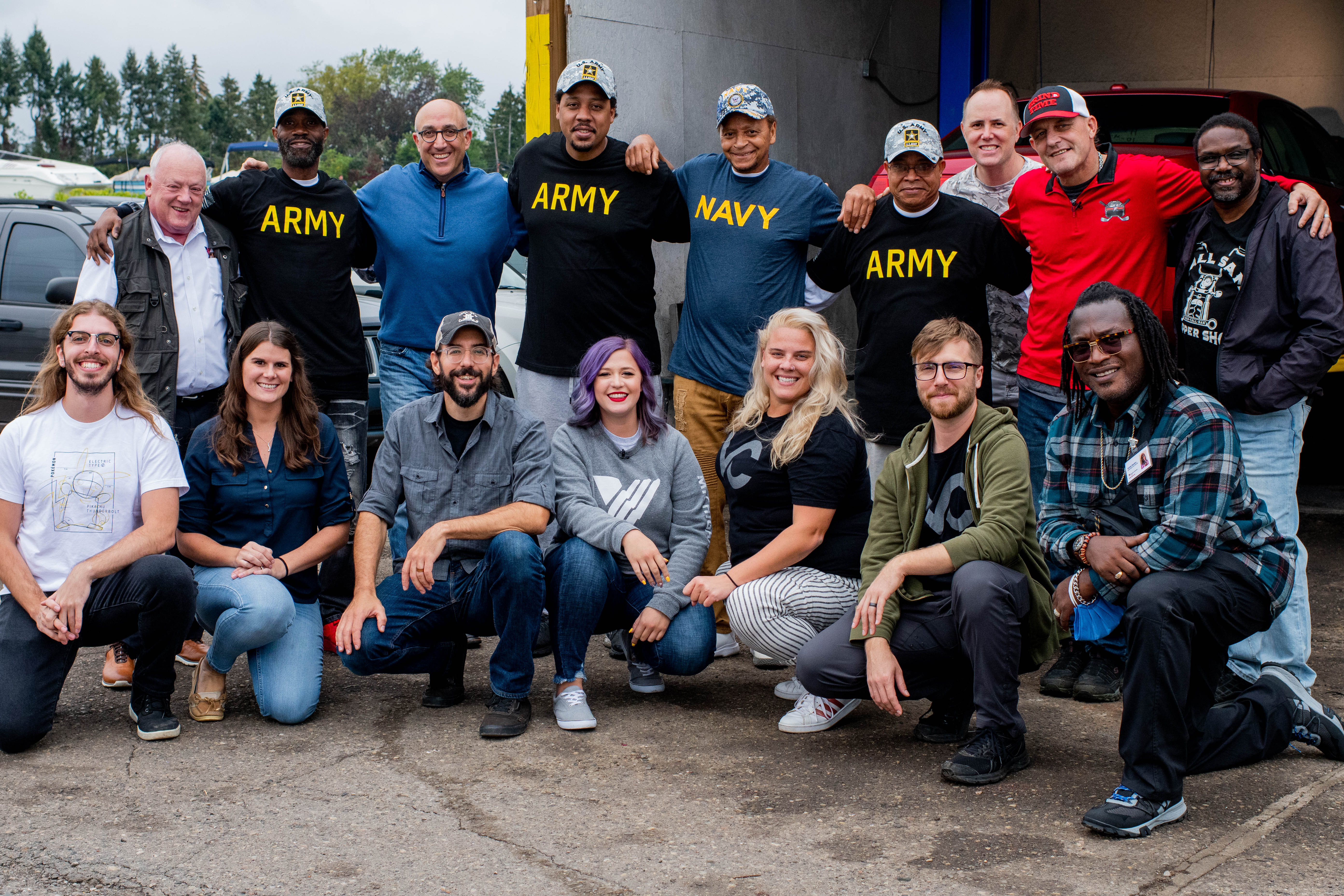 Group photo of everyone involved in the Cars for Veterans Program