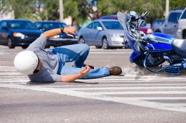 Man fallen over off motorcycle due to accident