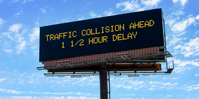 Electronic Billboard that reads Traffic Collision Ahead