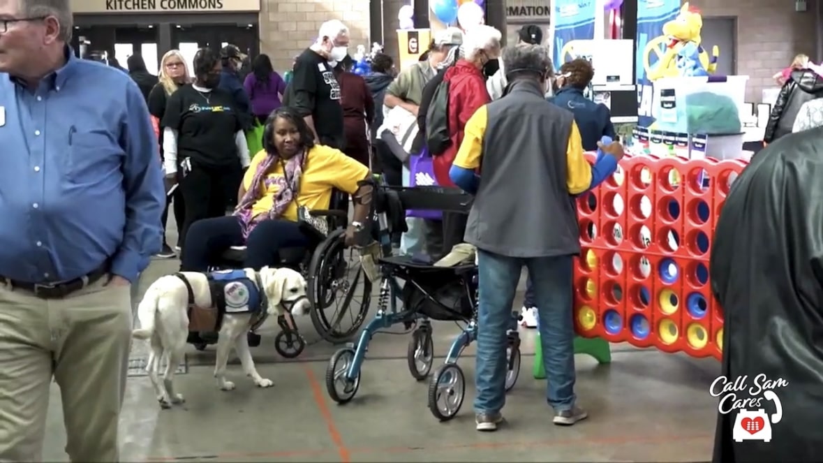 group of people at a fair for disabled persons