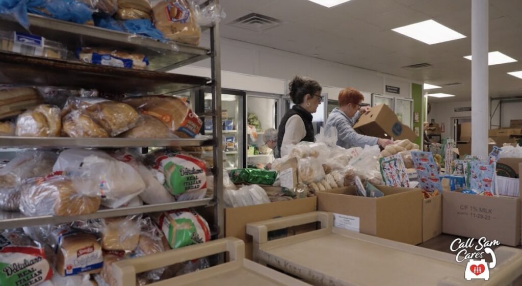 workers inside green apple pantry