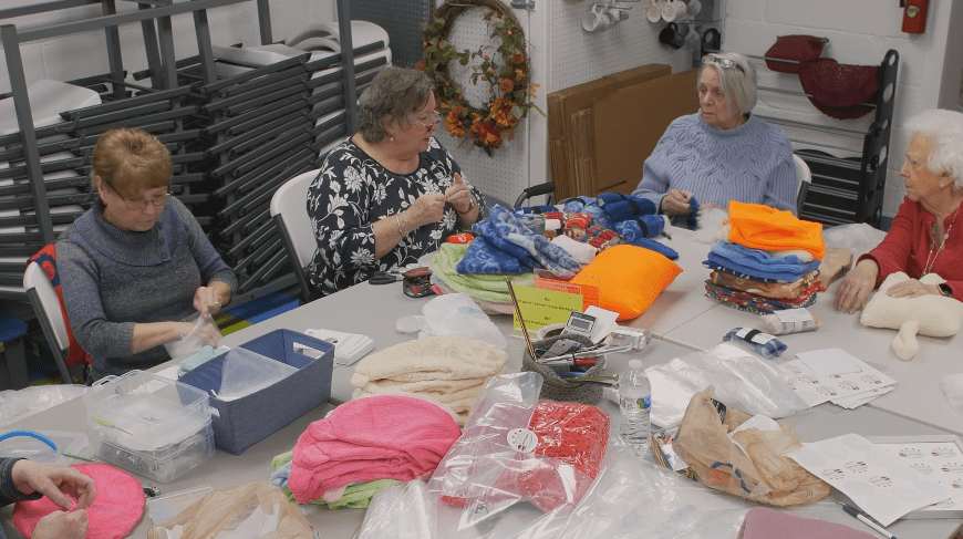 group of women knitting
