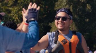 2 people slapping hands