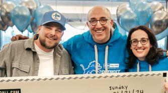 Bernstein' team with big check - Mark Bernstein and Beth Bernstein Miller