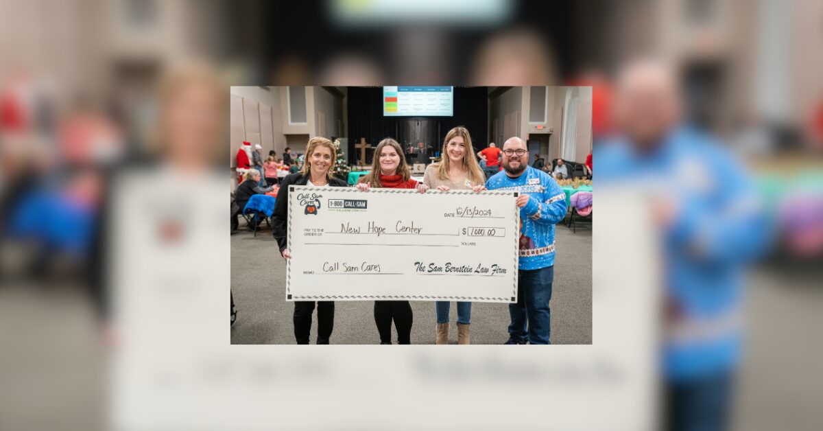 New Hope team with large check