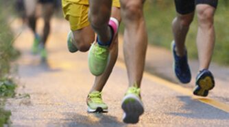 View of different sets of legs running in a race