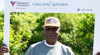 Veteran in photo booth at picnic event