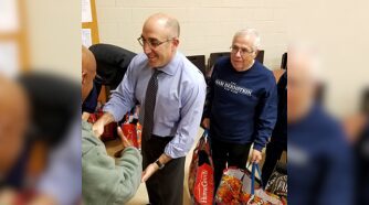 Mark Bernstein meeting veteran at event