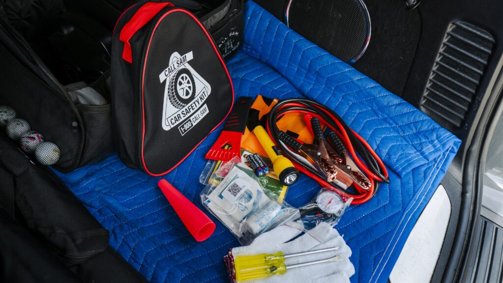 contents of the Call Sam Car Safety kit laid out in trunk